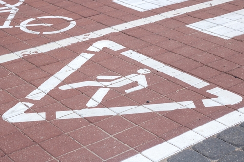 Crosswalk in Lenoir City, Tennessee with a visible pedestrian crossing sign on the pavement representing safety awareness and pedestrian accident prevention — used by Knoxville Car Accident Lawyers.