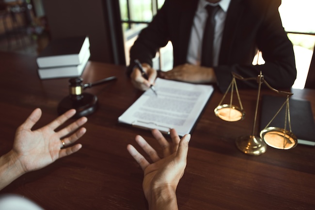 Gavel and percentage scale representing Tennessee's 50 percent bar rule in comparative fault car accident claims