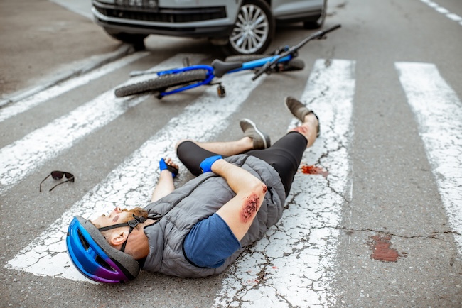 Bicycle colliding with vehicle showing the dangerous size difference and impact force on cyclist