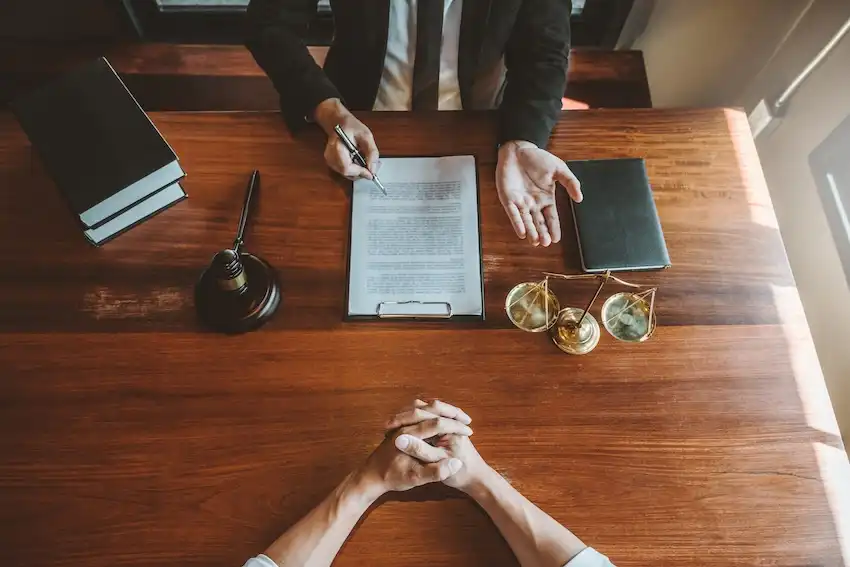 Knoxville car accident lawyer reviewing fault dispute evidence with an injured client during a free consultation in Tennessee