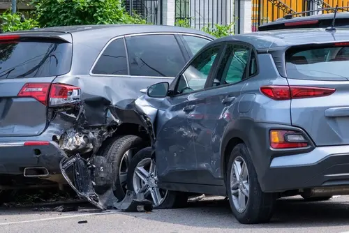 Two vehicles after a collision investigated by a Lenoir City rideshare accident lawyer.